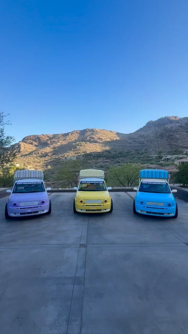 Three Capri Cars beneath the foothills