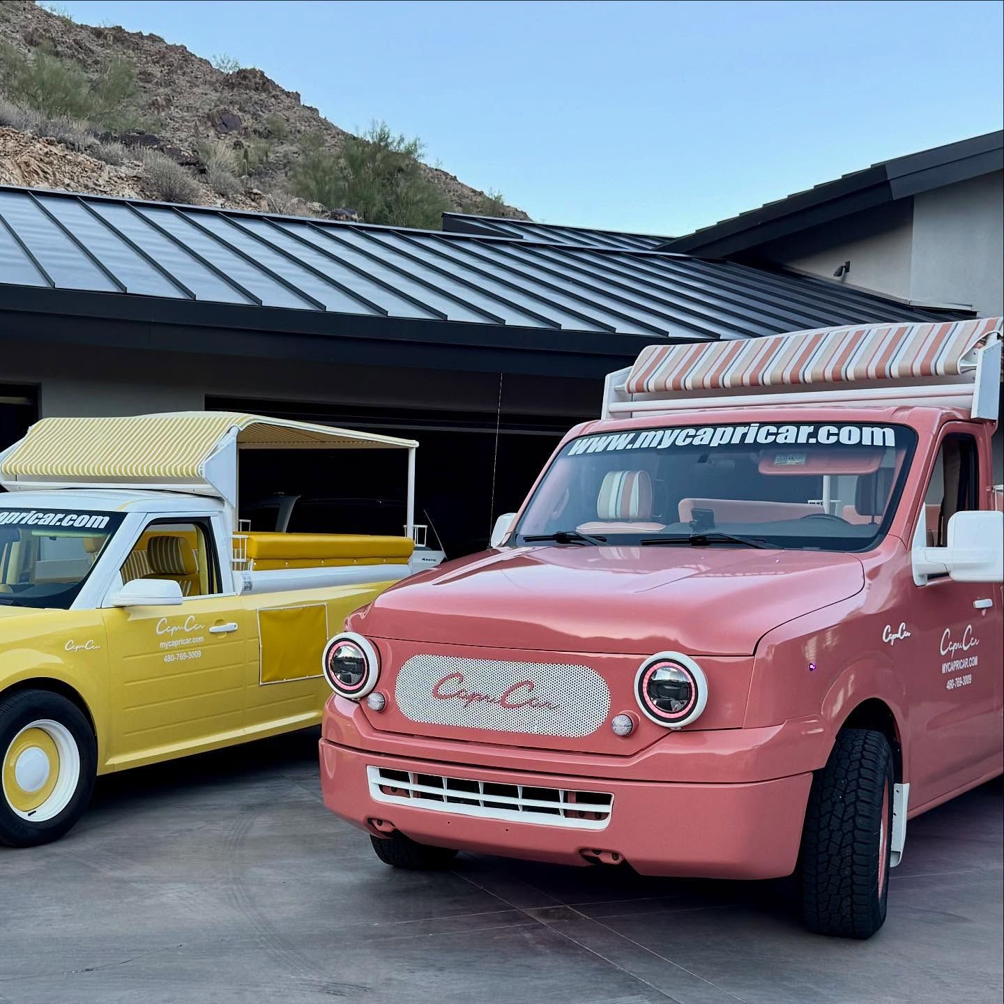Coral and yellow Capri Cars at a mountain resort